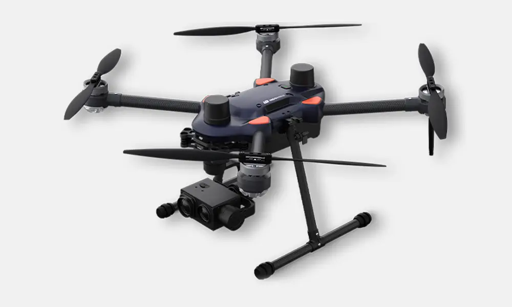 cyberone max drone in black and grey coloured has placed on white floor and background