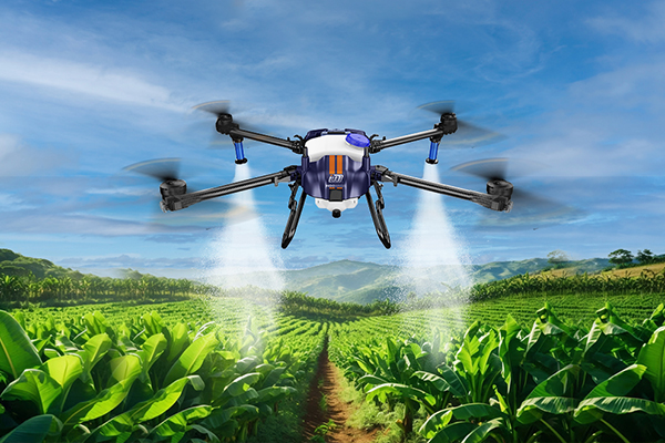 drone spraying water on crops